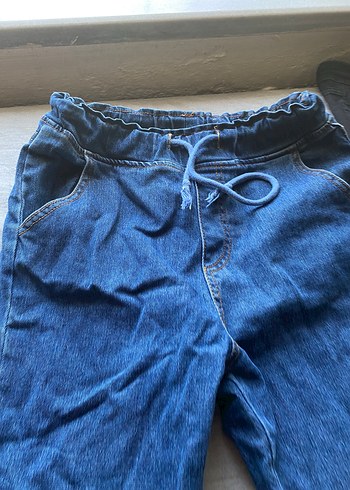 Kadın Mavi Düğmeli Bol Kesim Midi Kot Pantolon