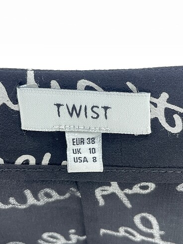 38 Beden siyah Renk Twist Midi Etek %70 İndirimli.