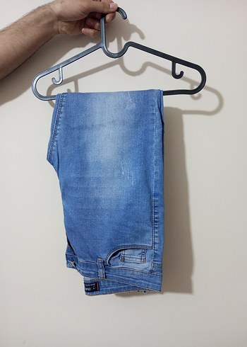 Paça püsküllü pantolon