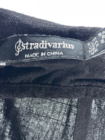 34 Beden siyah Renk Stradivarius Midi Etek %70 İndirimli.