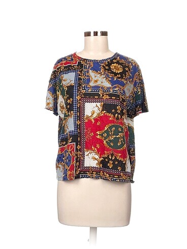 Zara Bluz %70 İndirimli.