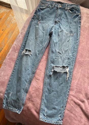 Kadın Mavi Yırtık Bol Kesim Denim Pantolon
