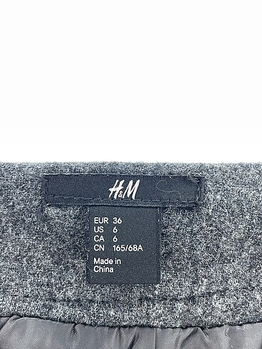 36 Beden siyah Renk H&M Mini Etek %70 İndirimli.