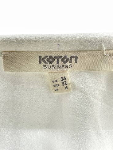 34 Beden beyaz Renk Koton Gömlek %70 İndirimli.