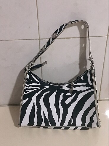 Diğer Zebra desenli kol çantası