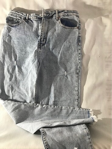 l Beden mavi Renk Paçası püsküllü esnek kot pantolon
