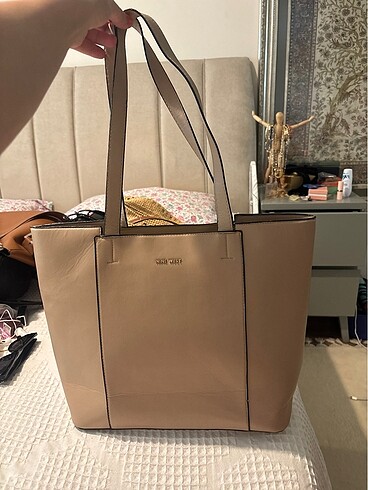 Nine West Nine west kol çantası krem sadeliğin şıklığı