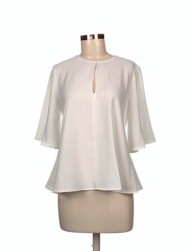 Zara Bluz %70 İndirimli.