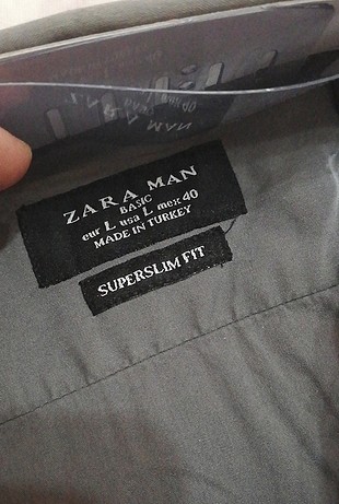 Zara hafif düğme yerınde defo var 