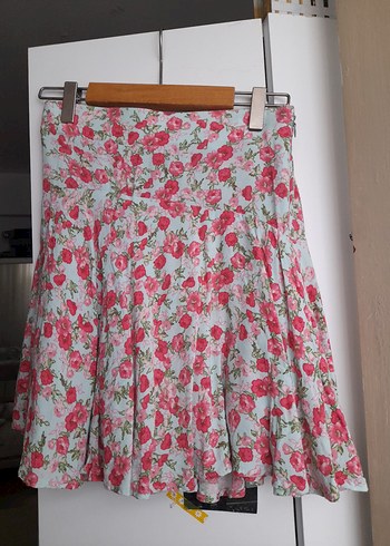 Pembe Çiçekli Mini Piliseli Etek