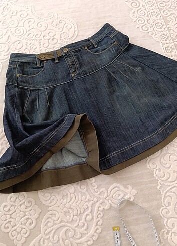 Benetton düşük bel taşlanmış kot etek 