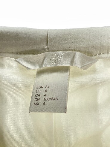 34 Beden beyaz Renk H&M Midi Etek %70 İndirimli.