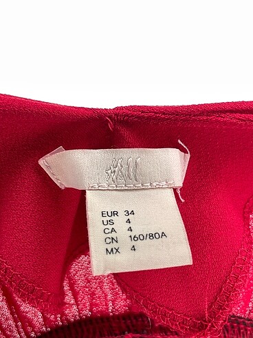 34 Beden kırmızı Renk H&M Uzun Tulum %70 İndirimli.