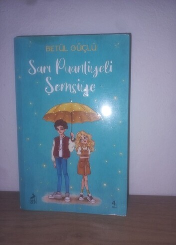 Sarı puantiyeli şemsiye