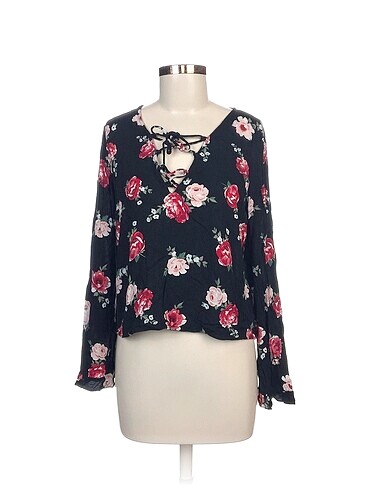 H&M Bluz %70 İndirimli.