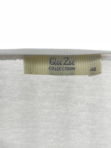 40 Beden beyaz Renk Quzu T-shirt %70 İndirimli.