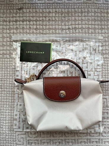 Longchamp xs pouch krem '