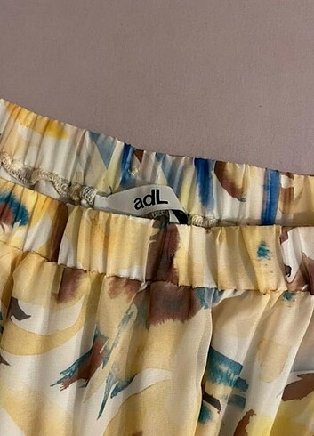 Adil Işık adl elbise