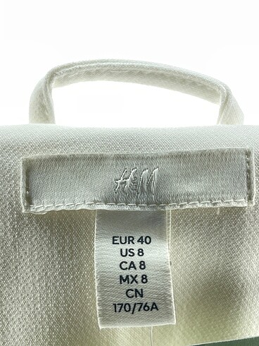 40 Beden beyaz Renk H&M Yelek %70 İndirimli.