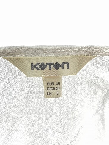 36 Beden beyaz Renk Koton Bluz %70 İndirimli.