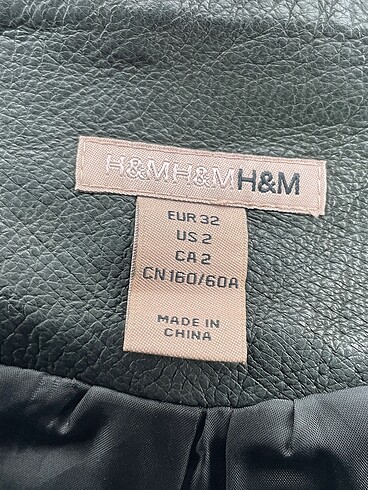 32 Beden siyah Renk H&M Mini Etek %70 İndirimli.
