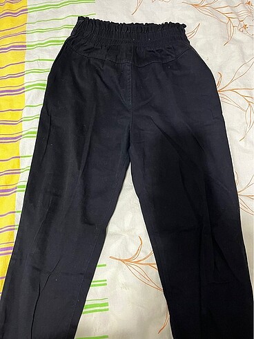 Beli lastikli kot pantolon