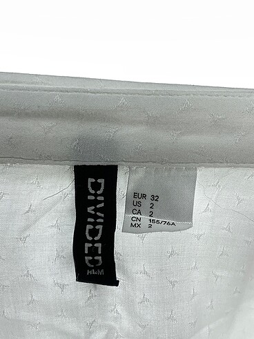 32 Beden beyaz Renk H&M Gömlek %70 İndirimli.