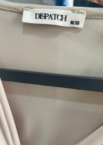 Bej bluz bir kez giyildi