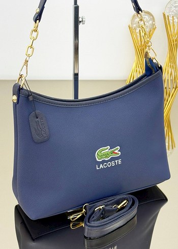 LACOSTE

HEM KOL HEM ÇAPRAZ 

ÖLÇÜLER 34x22 CM - Görsel 6