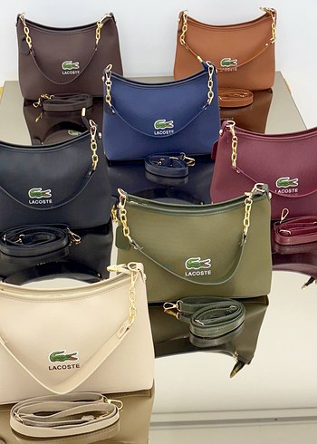LACOSTE

HEM KOL HEM ÇAPRAZ 

ÖLÇÜLER 34x22 CM - Görsel 9