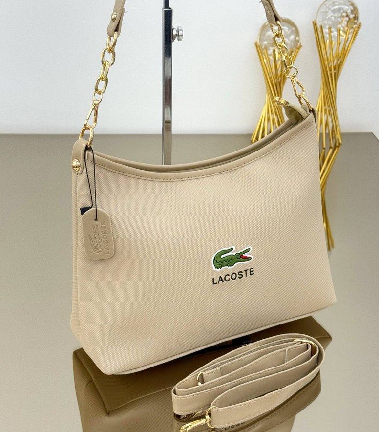 LACOSTE

HEM KOL HEM ÇAPRAZ 

ÖLÇÜLER 34x22 CM - Görsel 2