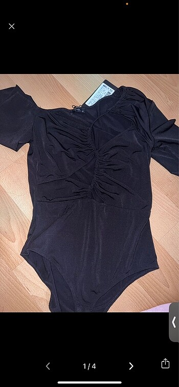 Asimetri kesimli bodysuit