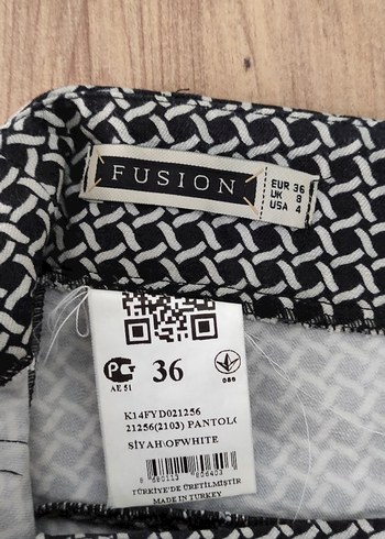 Siyah Beyaz desenli pantolon - Görsel 6