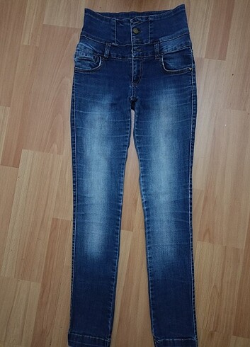 Kadın koyu mavi açık efektli likralı dar paça kot pantolon