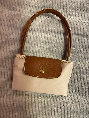 Longchamp canta