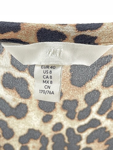 40 Beden çeşitli Renk H&M Midi Etek %70 İndirimli.