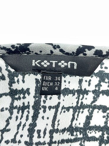34 Beden çeşitli Renk Koton Bluz %70 İndirimli.
