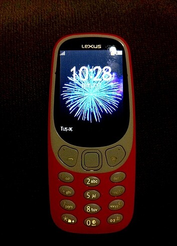 Turuncu tuşlu telefon 