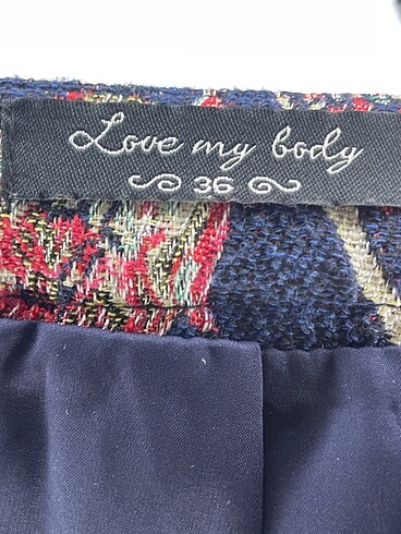 36 Beden çeşitli Renk Love My Body Midi Etek %70 İndirimli.