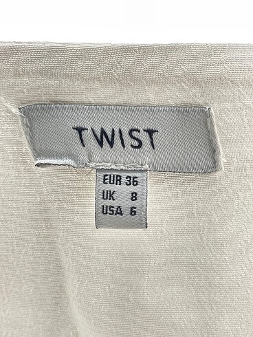 36 Beden beyaz Renk Twist Bluz %70 İndirimli.