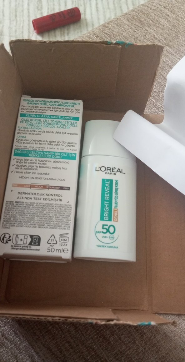 L'Oréal Paris Bright Reveal SPF 50  renkli Güneş  Koruyucu - Görsel 2