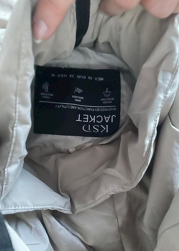 krem rengi şişme mont
