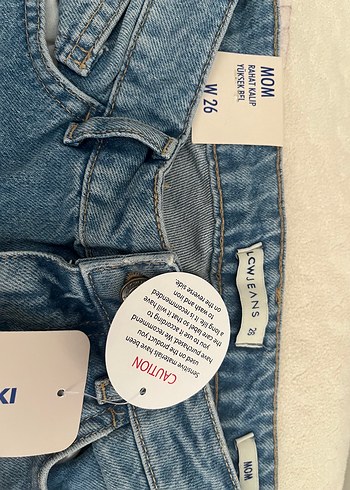 26 Beden Kadın Mavi Yırtık Detaylı Bol Kesim Denim Pantolon