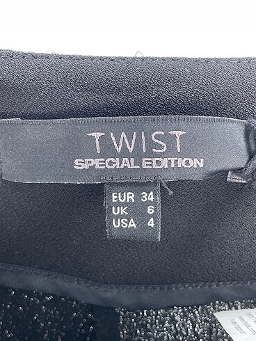 34 Beden siyah Renk Twist Düz Kesim %70 İndirimli.