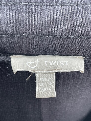 34 Beden siyah Renk Twist Midi Etek %70 İndirimli.