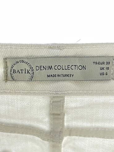 38 Beden beyaz Renk Batik Mini Etek %70 İndirimli.