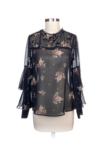 Zara Bluz %70 İndirimli.