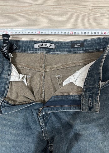 Erkek pantolon. Paçasında çamasır suyu lekesi var. - Görsel 5