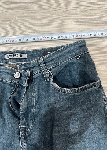 Erkek pantolon. Paçasında çamasır suyu lekesi var. - Görsel 4