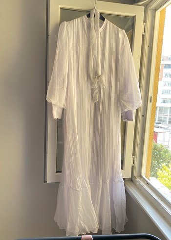 Beyaz nikah elbisesi pileli